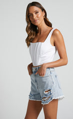 Mindae Shorts - Recycled Cotton Ripped Denim Shorts in Mid Blue Wash